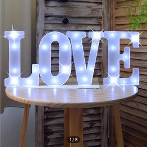 8.3in tall light up LED L.O.V.E letters. Batteries included.